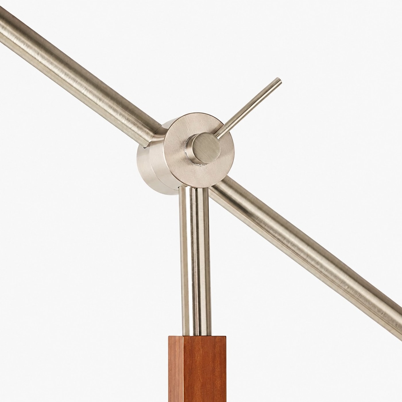 Brushed metal swing arm joint detail