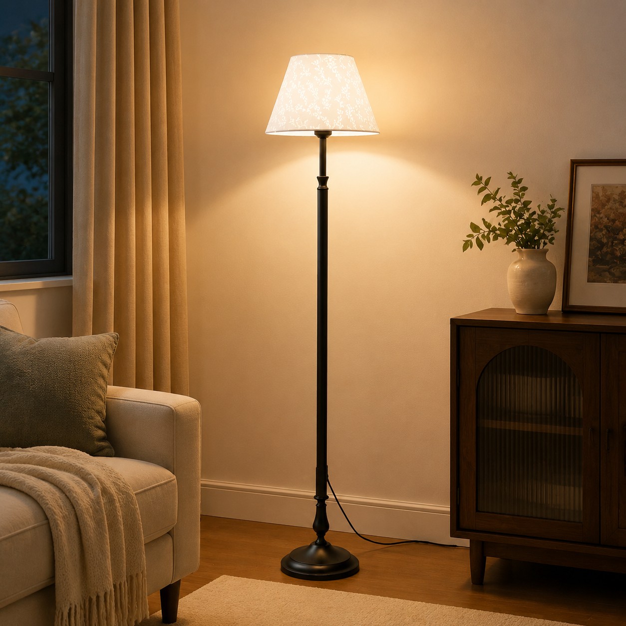 Fabric shade floor lamp styled beside a living room sofa
